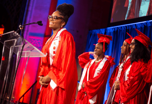 graduating student at podium